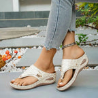 Toe Post Wedge Sandals in beige PU leather with crocodile pattern and gold button detail on mid heel platform