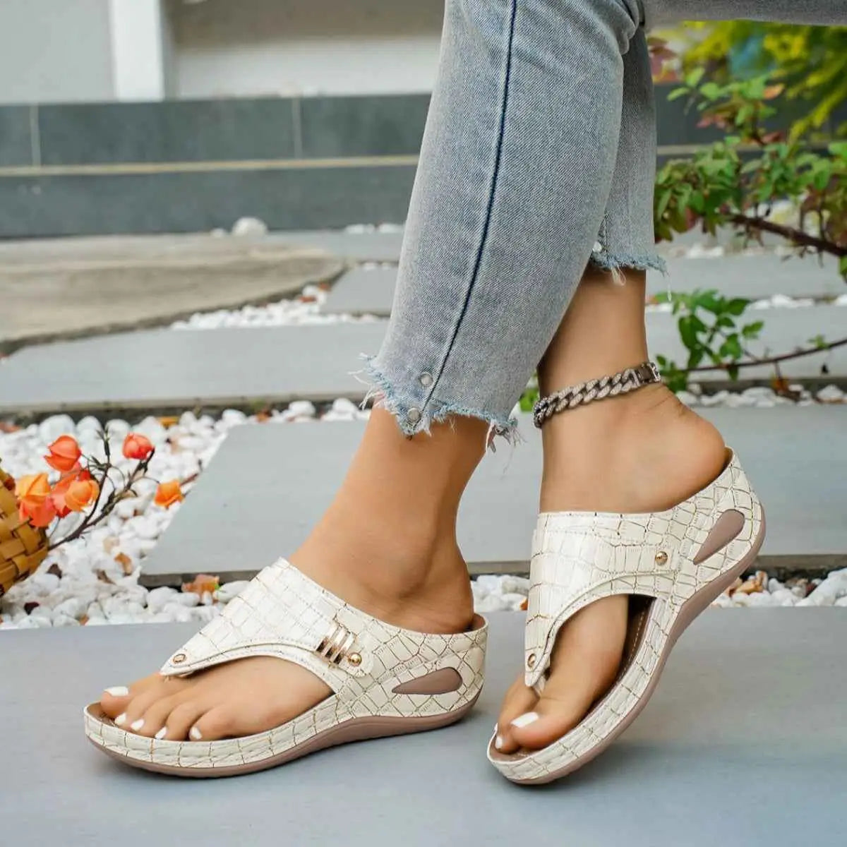 Toe Post Wedge Sandals in beige PU leather with crocodile pattern and gold button detail on mid heel platform