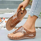 Toe Post Wedge Sandals in brown PU leather with crocodile pattern, mid heel, and gold-tone buckle detailing