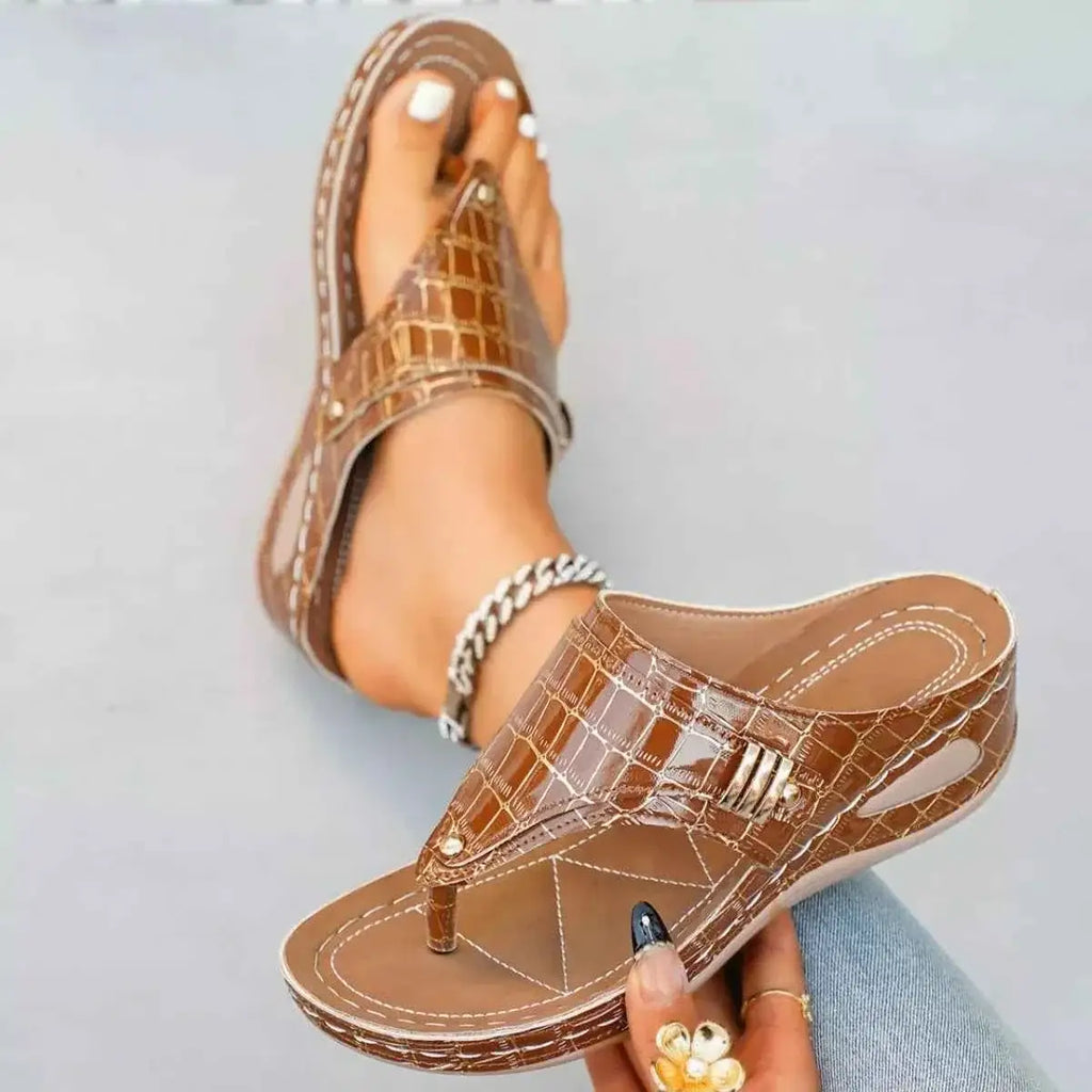Toe Post Wedge Sandals in brown crocodile-patterned PU leather with mid-height heels and white contrast stitching