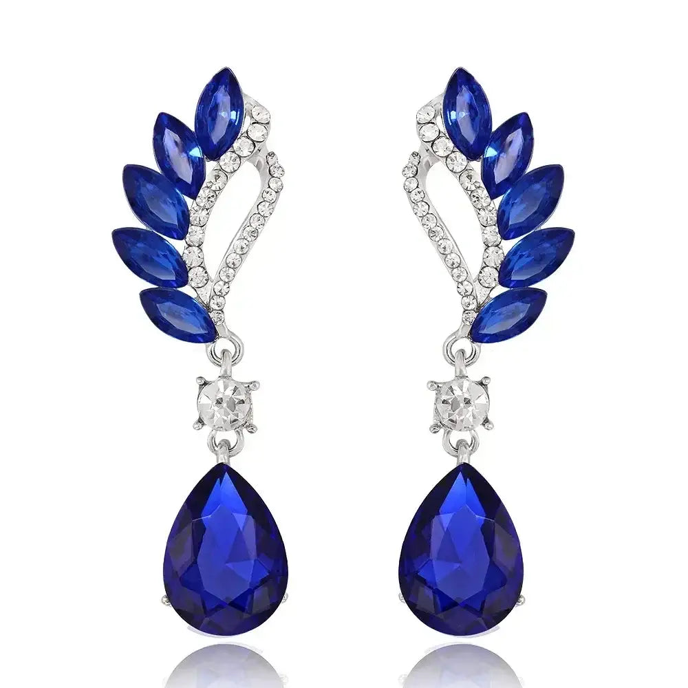 TREAZY Fashion Crystal Earrings with vibrant blue teardrop crystals, silver metal setting, and small clear rhinestones in a leaf design
