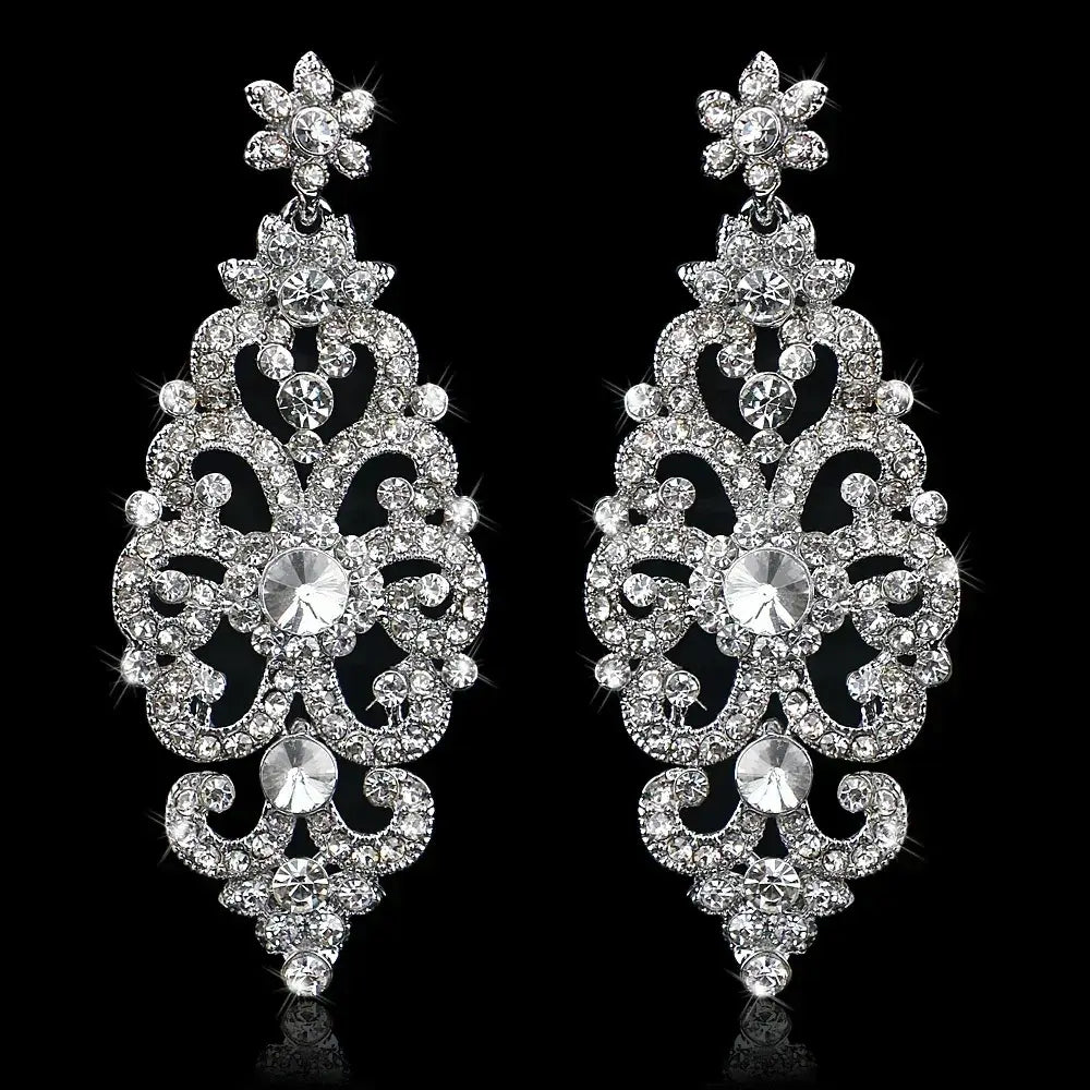 TREAZY Fashion Crystal Earrings featuring intricate silver plated zinc alloy with clear rhinestone crystals in a floral and swirl drop design