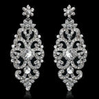 TREAZY Fashion Crystal Earrings featuring intricate silver plated zinc alloy with clear rhinestone crystals in a floral and swirl drop design