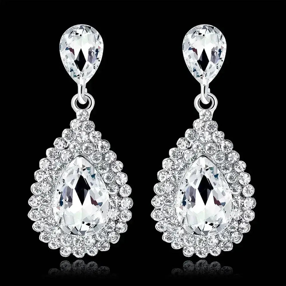 TREAZY Fashion Crystal Earrings with silver-plated zinc alloy featuring teardrop-shaped clear crystals and surrounding rhinestones