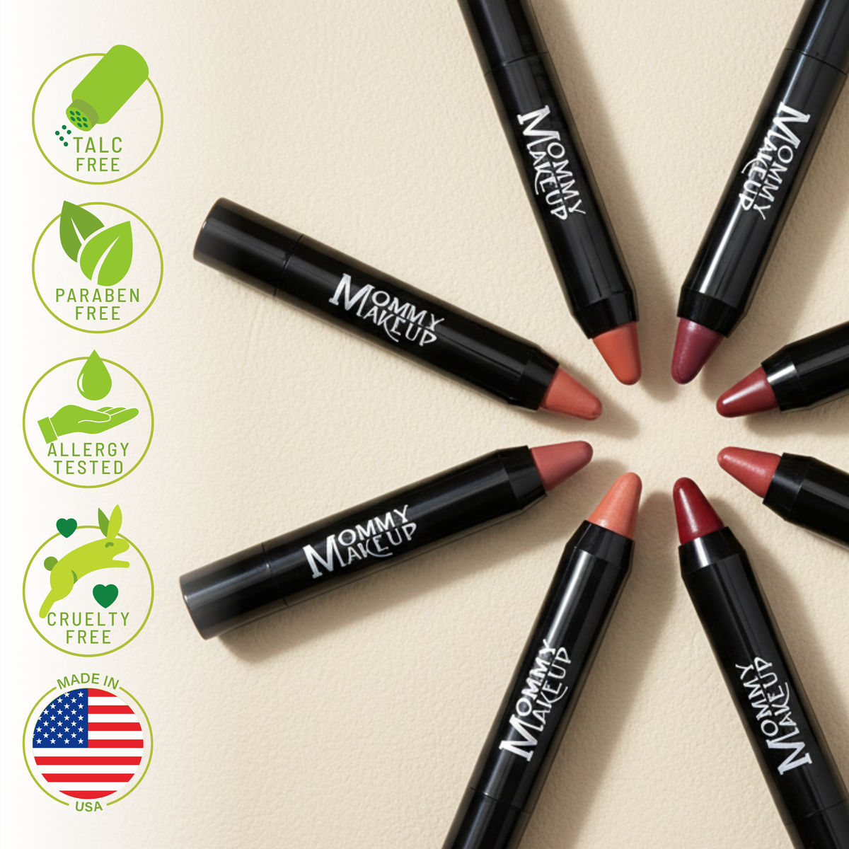 Triple Sticks lipsticks in black tubes with various nude and pink shades arranged in a circle showing creamy texture
