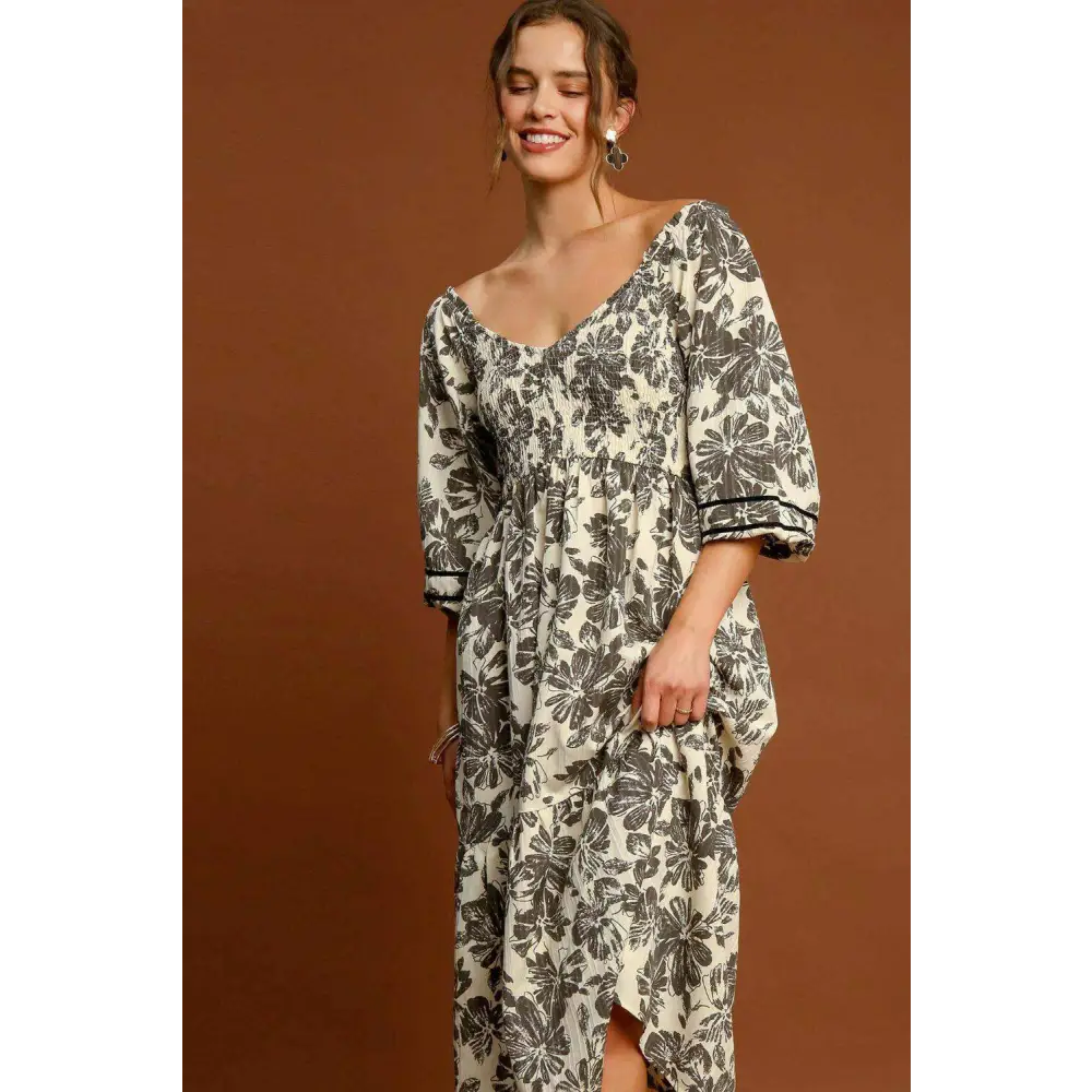 Elevate your wardrobe with timeless designer luxury fashion for women $44.75 the ruffle hem flower printed v-neck dress