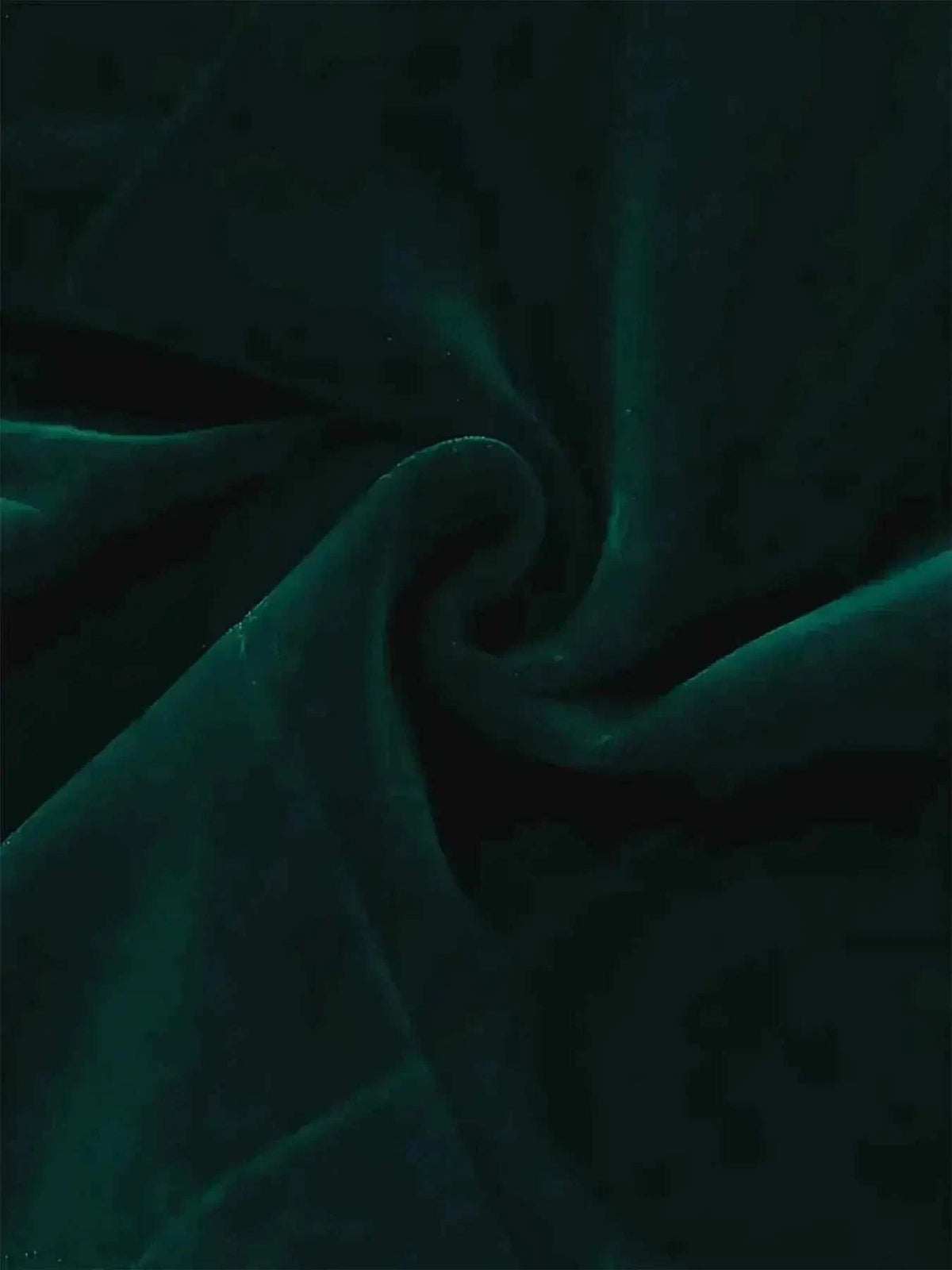 Velvet Double-Breasted Blazer fabric in deep emerald green with a soft, smooth texture and subtle stretch.