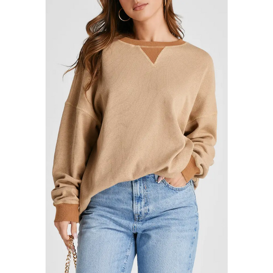 Elevate your wardrobe with this luxury fashion waffle-knit sweatshirt $27.99 this exquisite piece showcases a basic