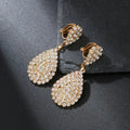 Water Drop Clip On Earrings with gold-tone metal and sparkling cubic zirconia crystals in a teardrop dangle design