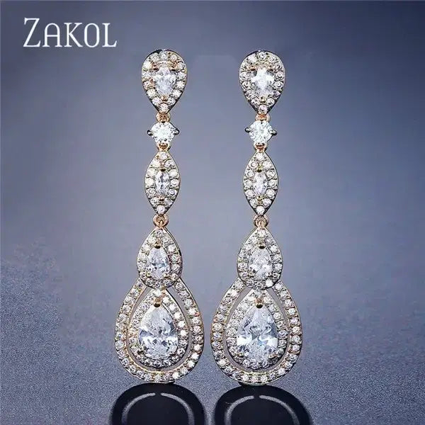 Water Drop Cubic Zircon long dangle earrings in silver metal with multiple clear cubic zircon stones arranged in water drop shapes