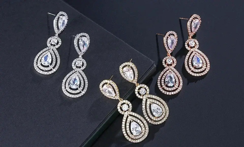 Water Drop Cubic Zircon long dangle earrings in silver, gold, and rose gold tones with teardrop and circular patterns