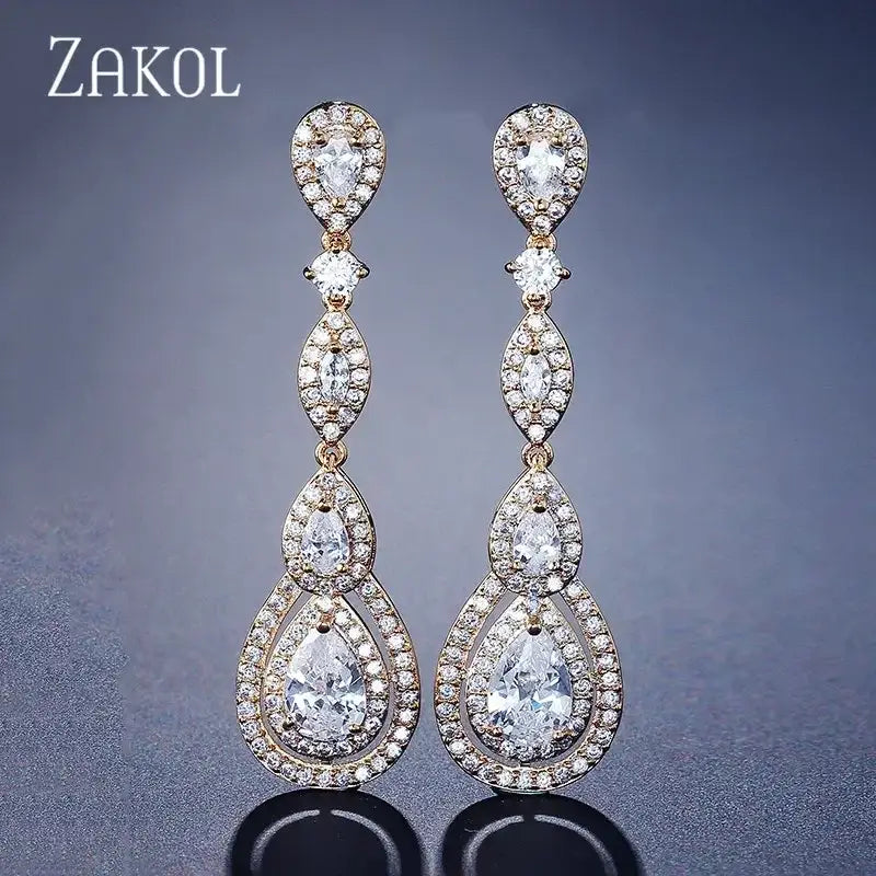 Elegant Water Drop Cubic Zircon long dangle earrings in silvery metal with clear sparkling stones and intricate detailing
