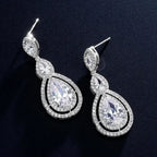 Elegant Water Drop Cubic Zircon long dangle earrings in silver with sparkling clear stones and teardrop design