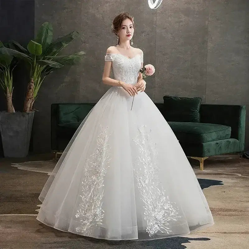 Wedding Dress 2024 white ball gown with off-the-shoulder short sleeves, V-neckline, lace appliques and embroidery, princess waist