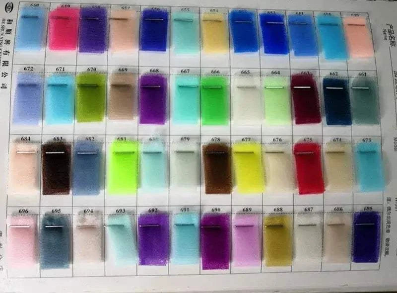 Wedding Dresses fabric color swatches in various bright and pastel shades of polyester tulle arranged in rows and columns on a sheet
