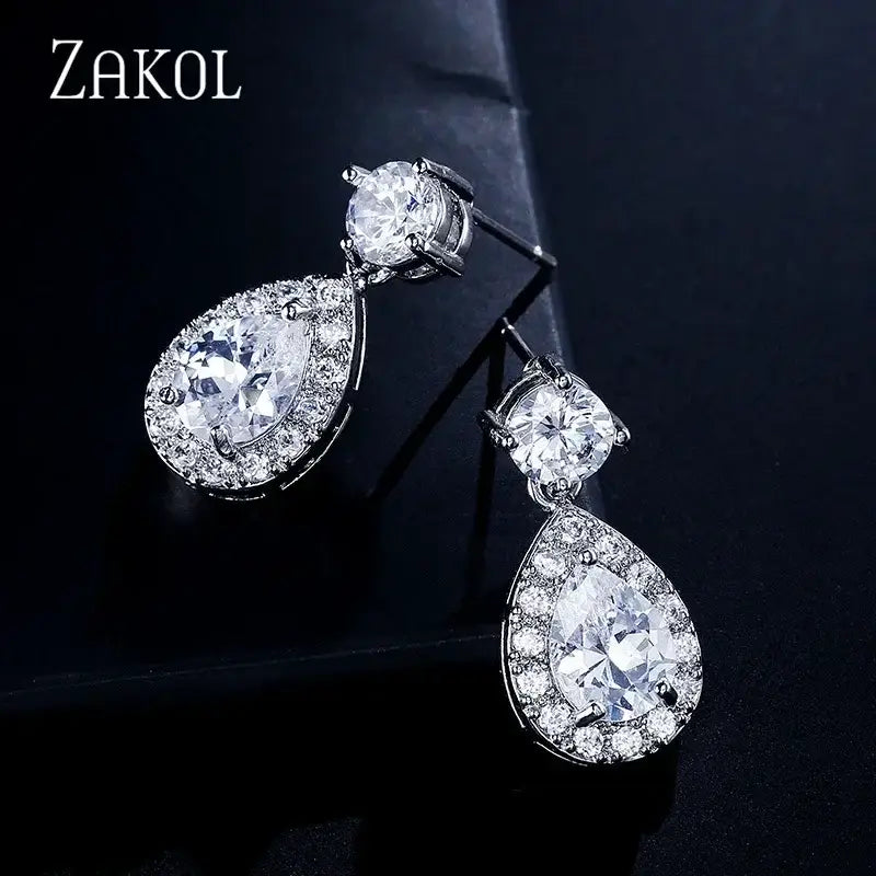 ZAKOL Classic Water Drop Earrings in silver tone with clear cubic zirconia stones featuring a large teardrop and smaller round stones