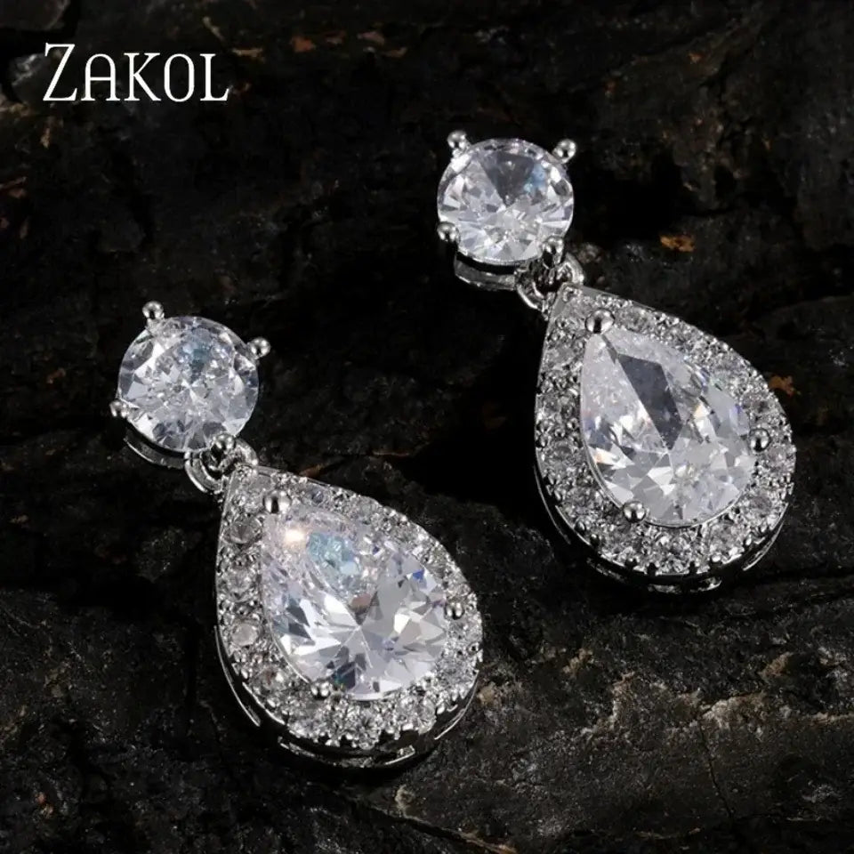 ZAKOL Classic Water Drop Earrings in silver tone with clear cubic zirconia stones, featuring a round top and teardrop dangle design