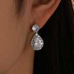 ZAKOL Classic Water Drop Earrings featuring white cubic zirconia dangle design with teardrop and round stones in silver-tone metal