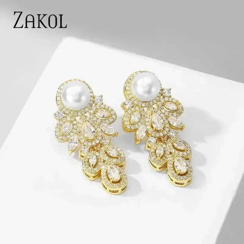 ZAKOL New Fashion gold-tone drop earrings with white simulated pearl tops and clear cubic zirconia leaf patterns