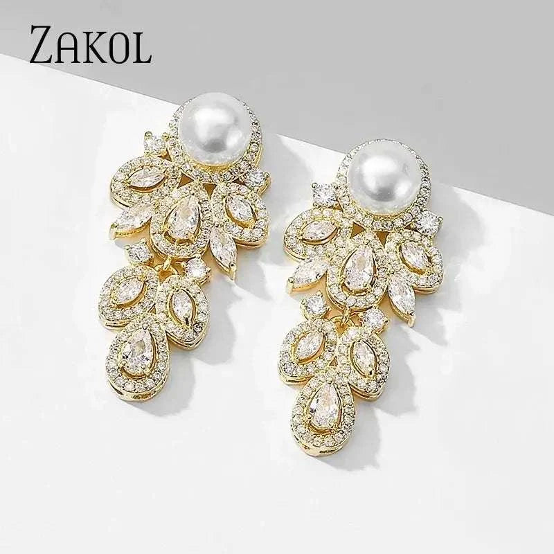 ZAKOL New Fashion white simulated pearl and cubic zirconia crystal leaf drop earrings in gold-tone metal for women