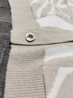 Zebra Print Button Up cardigan in beige and white polyester with a button and ribbed knit detailing