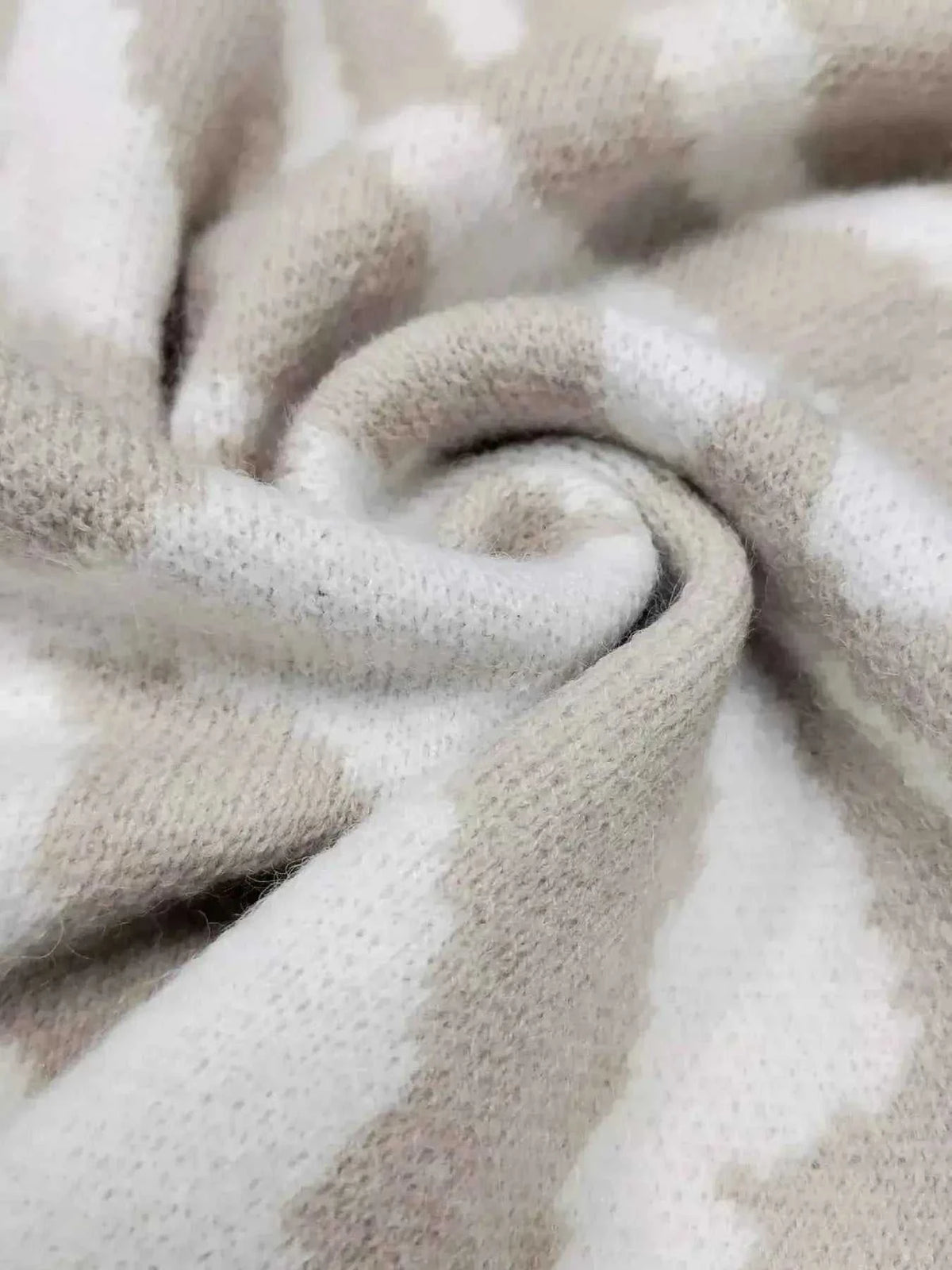 Zebra Print Button Up fabric in soft beige and off-white with a subtle animal stripe pattern, slightly stretchy polyester